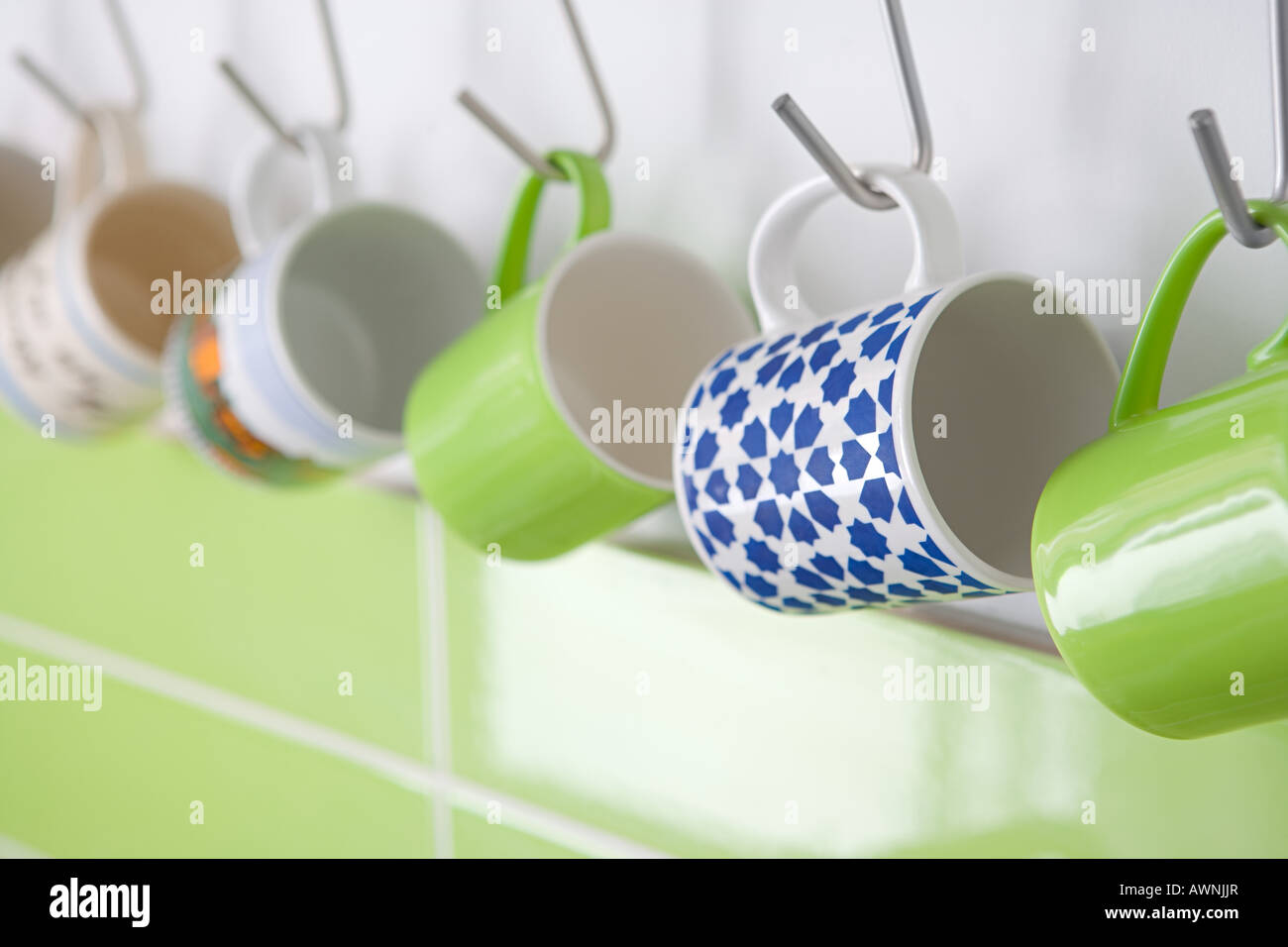 Cups hanging on hooks hires stock photography and images Alamy