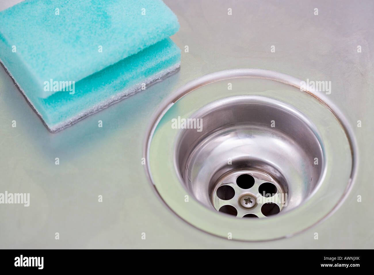 Plug hole and sponge Stock Photo Alamy