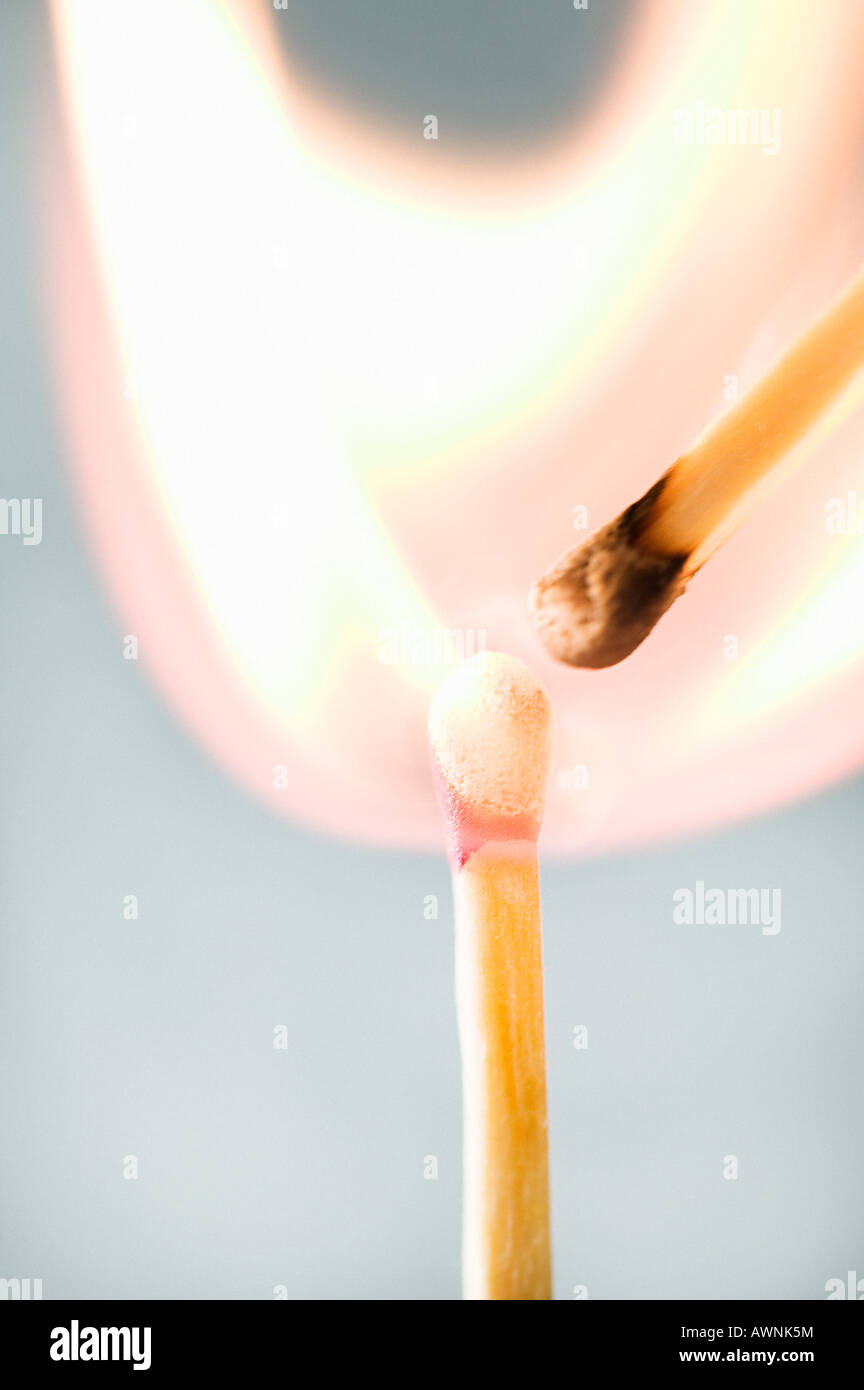 Two burning matches Stock Photo Alamy