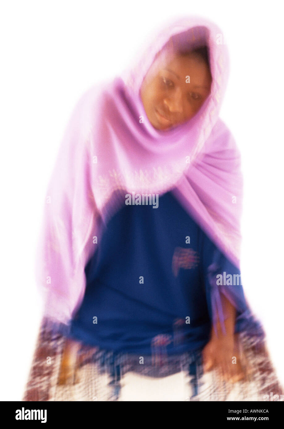 Muslim woman kneeling on floor hi-res stock photography and images - Alamy