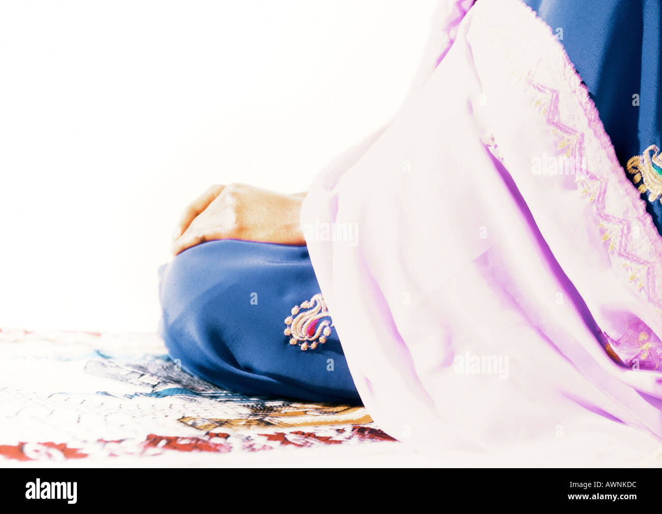 Muslim woman sitting on prayer hires stock photography and images Alamy