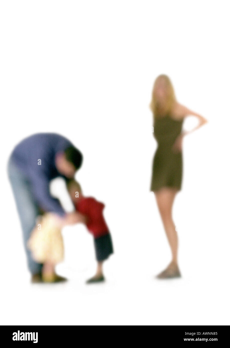 Silhouette of parents with two children, on white background, defocused ...