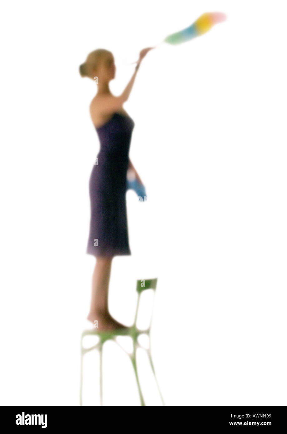 Silhouette of woman standing on chair and dusting, on white background,  defocused Stock Photo - Alamy