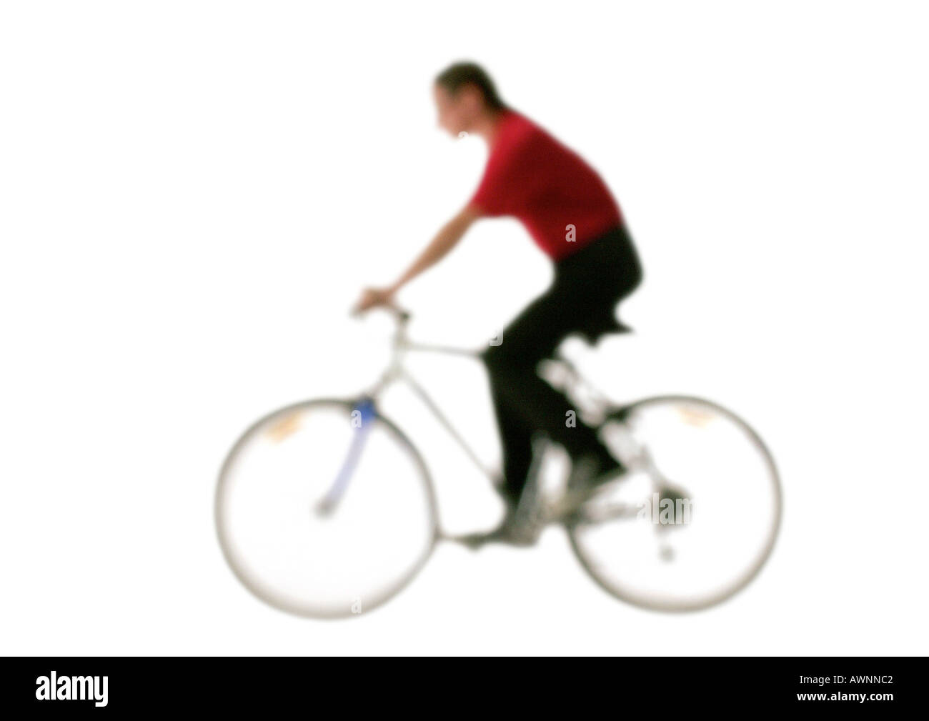 Silhouette of person on bicycle, side view, on white background, defocused Stock Photo