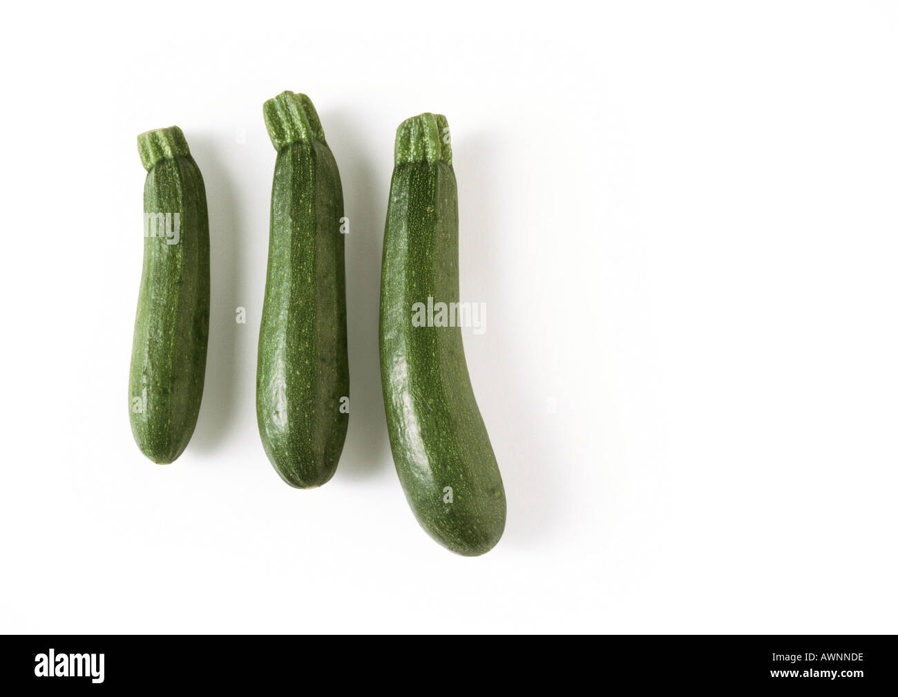 Three zucchini, full length Stock Photo