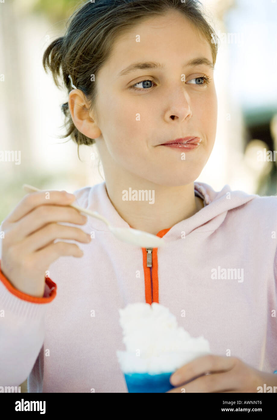 Girl eating sweet desset Stock Photo