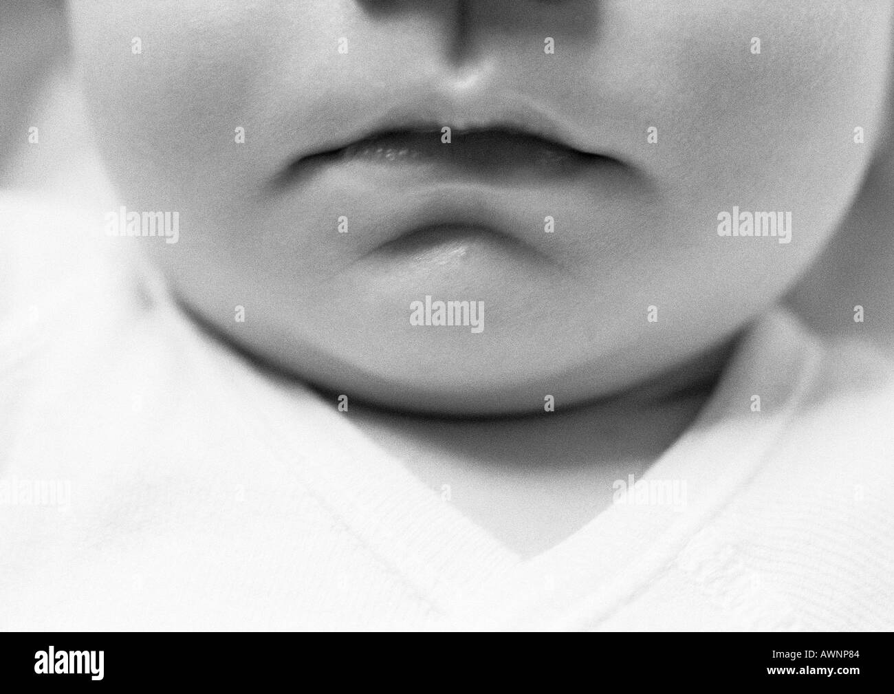 Baby's mouth, close-up, b&w Stock Photo