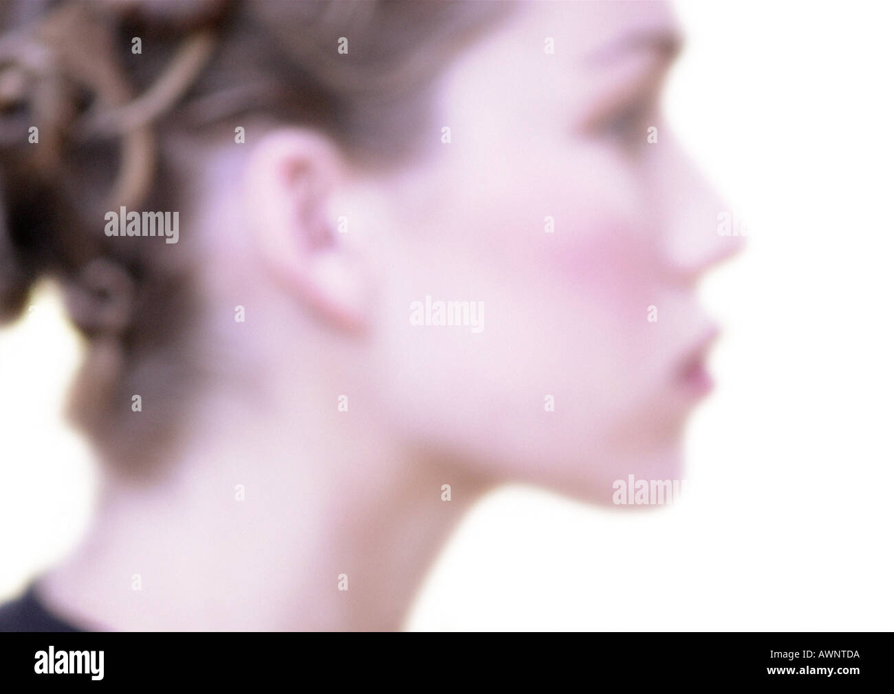 Woman's face, side view, blurred Stock Photo