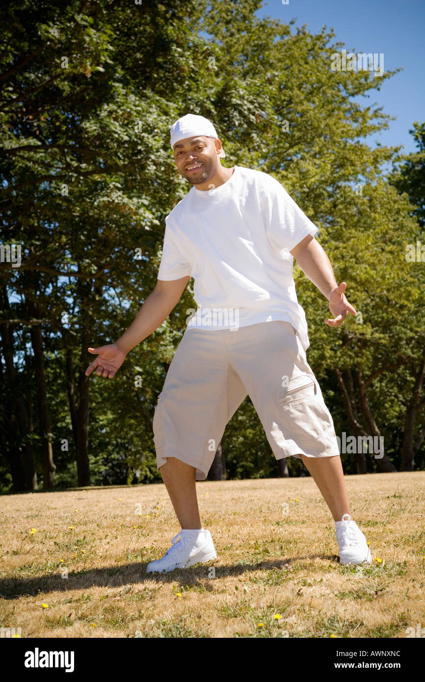 Man standing outdoors Stock Photo