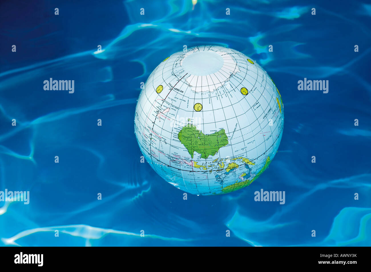 Globe in water Stock Photo
