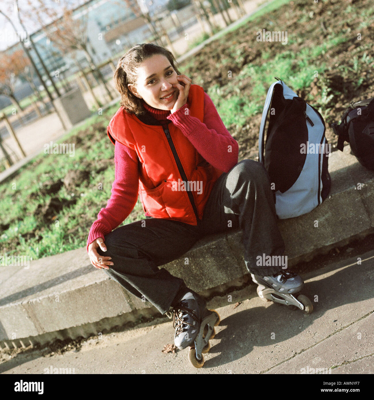 Young woman wearing inline skates, portrait Stock Photo