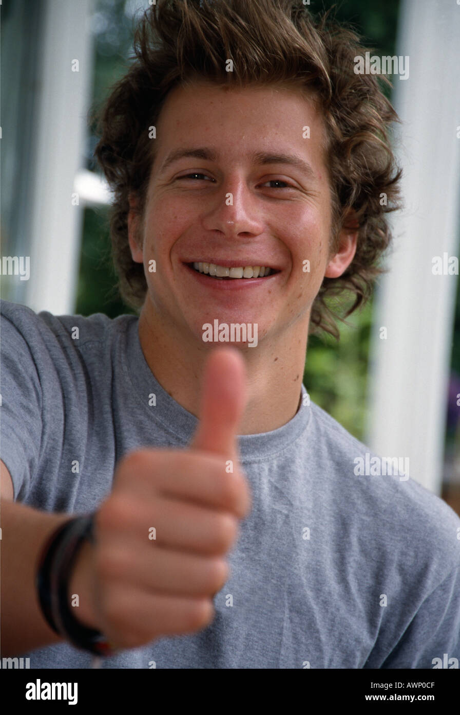 Person giving thumbs up hi-res stock photography and images - Alamy