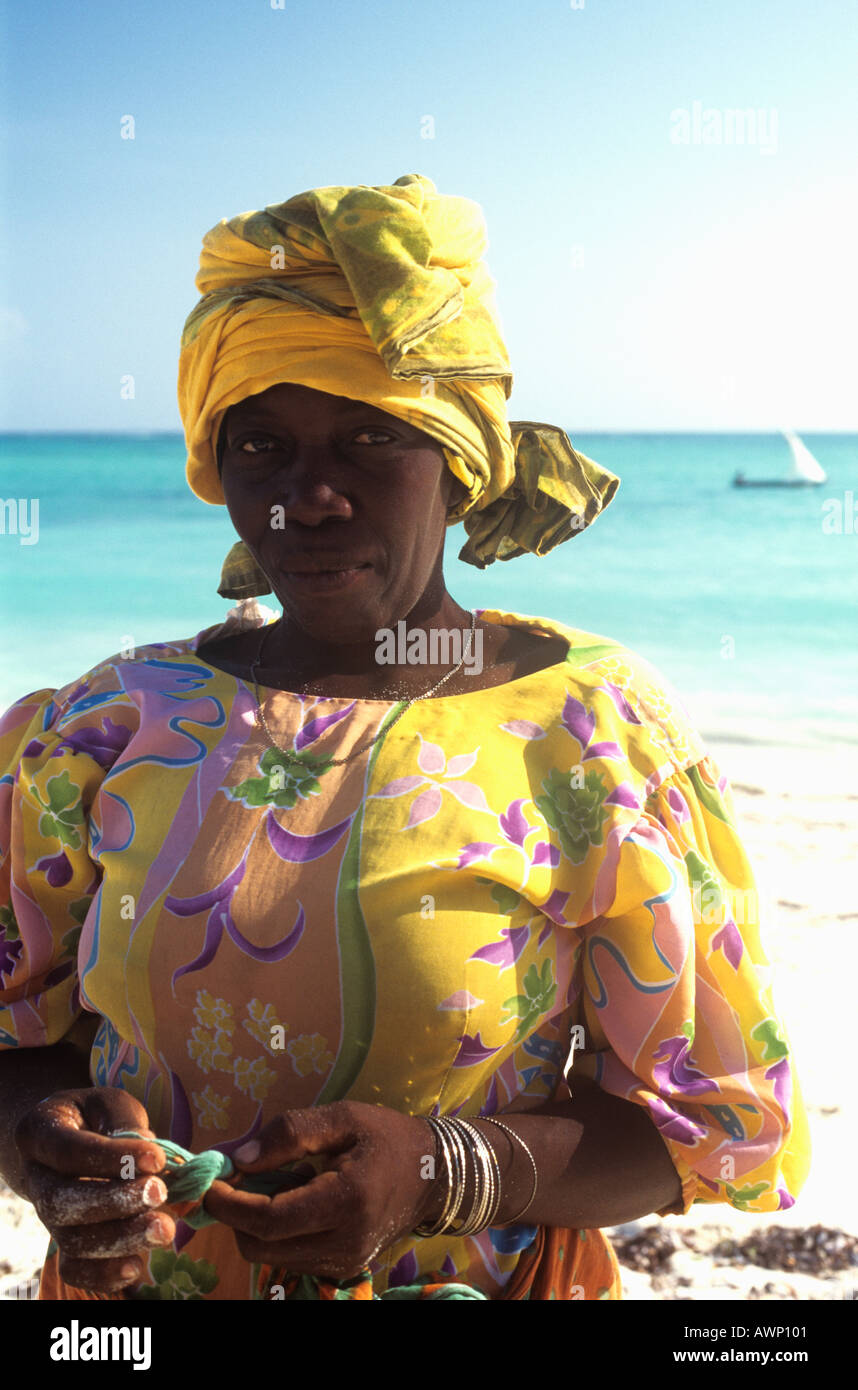 Portrait of local woman on the beach at Nungwi on the north west of Zanzibar Island, Tanzania Stock Photo