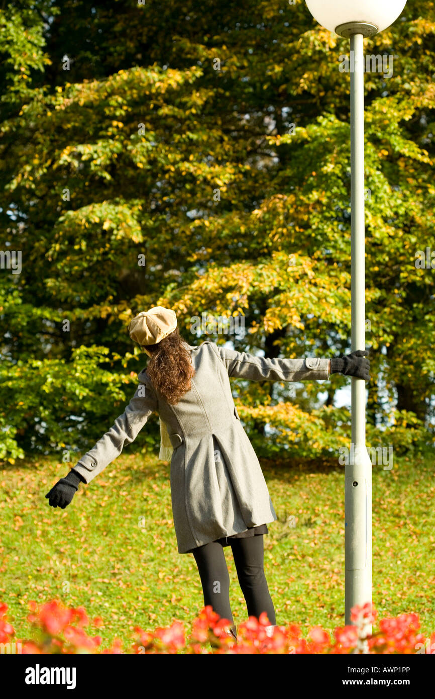 Woman in the autumn in the park Stock Photo - Alamy