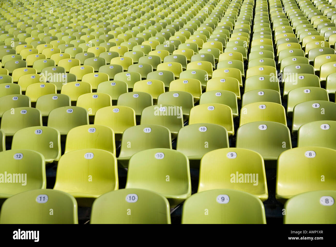 Green seats in a row Stock Photo
