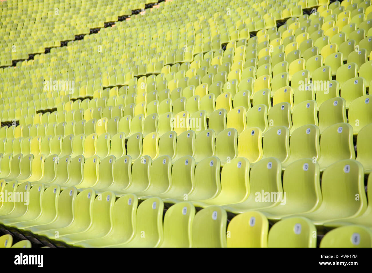 Green seats in a football stadium Stock Photo