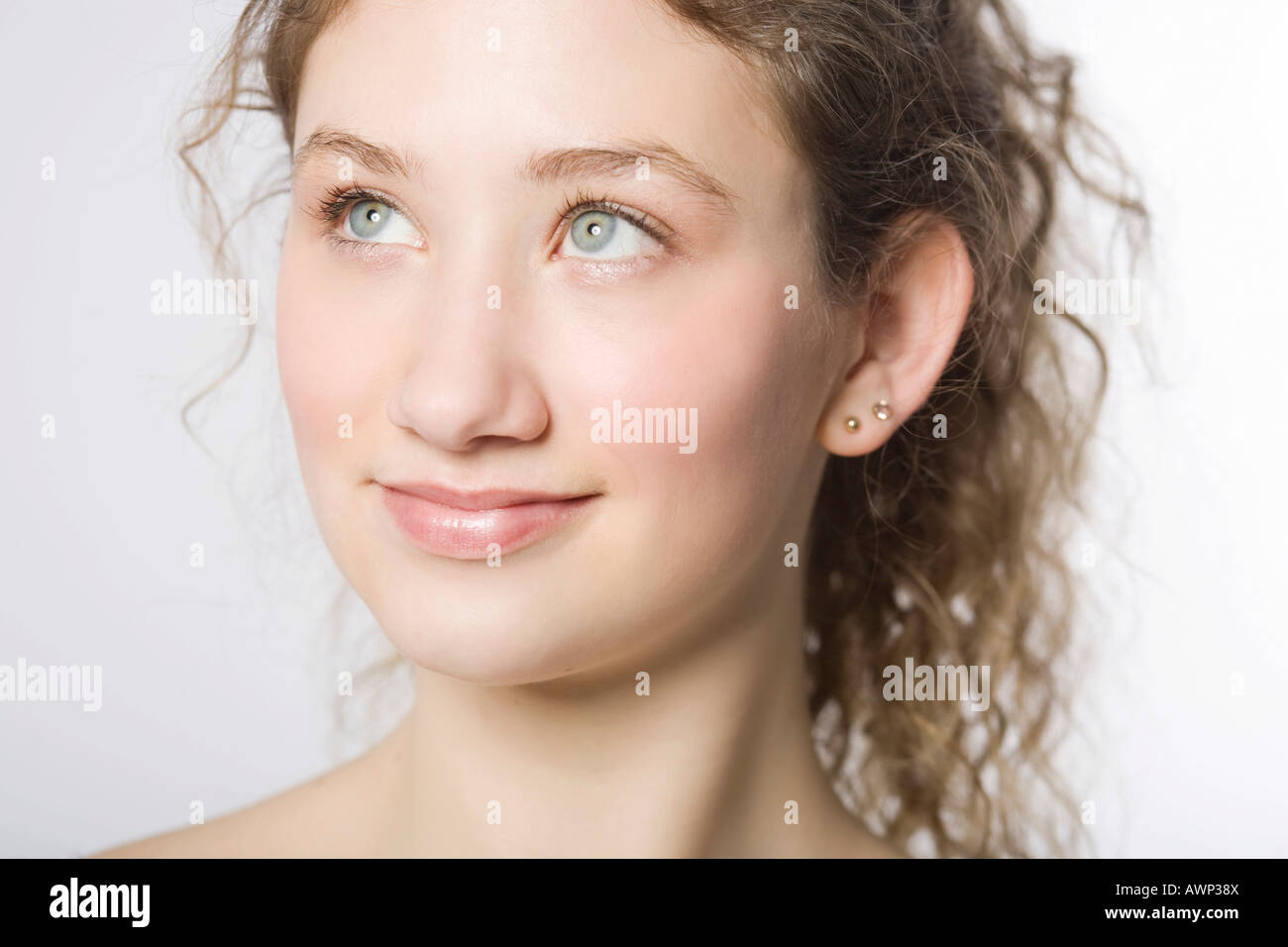 Curly brown hair brown eye hi-res stock photography and images - Alamy