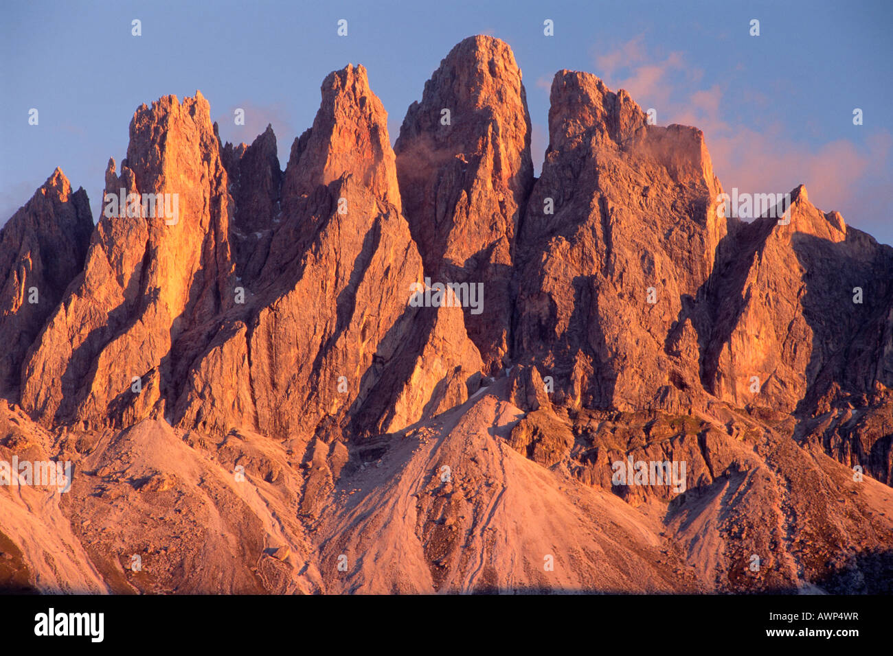 Geisler Group peaks glowing at sunset, Dolomites, Bolzano-Bozen, Italy, Europe Stock Photo