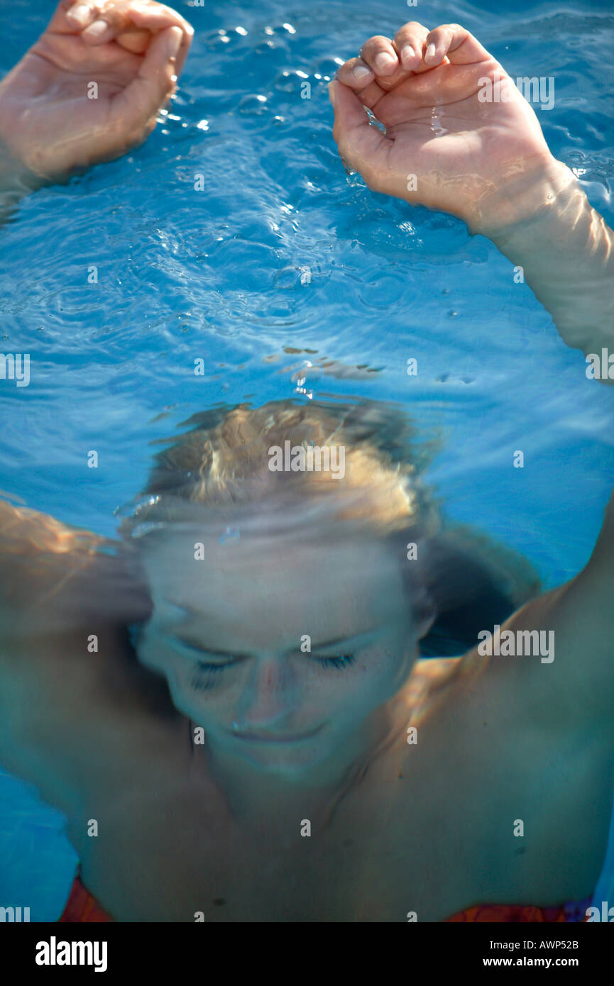 WOMAN UNDERWATER IN SWIMMING POOL Stock Photo - Alamy
