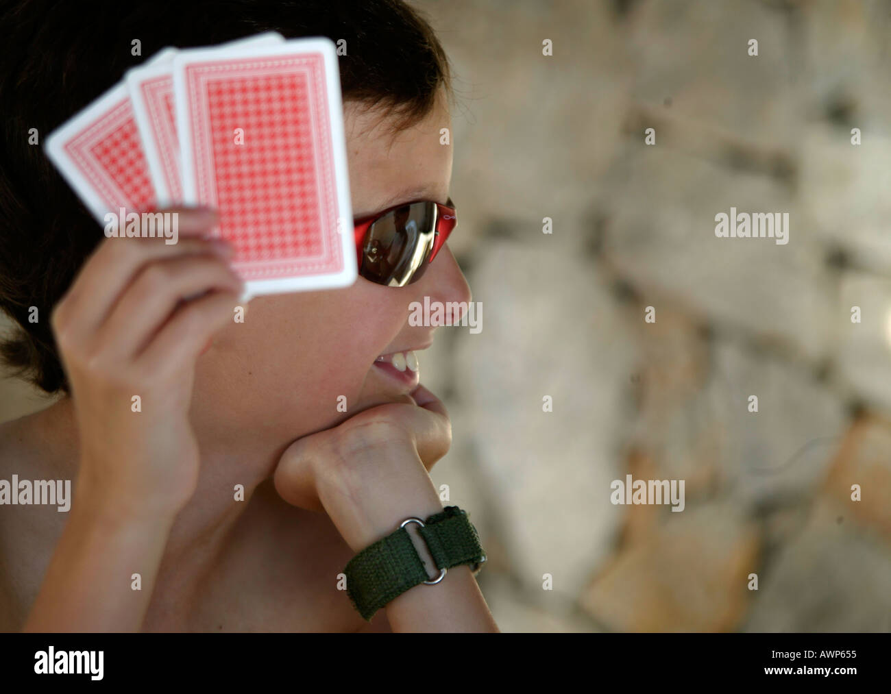 Boy playing cards Stock Photo Alamy