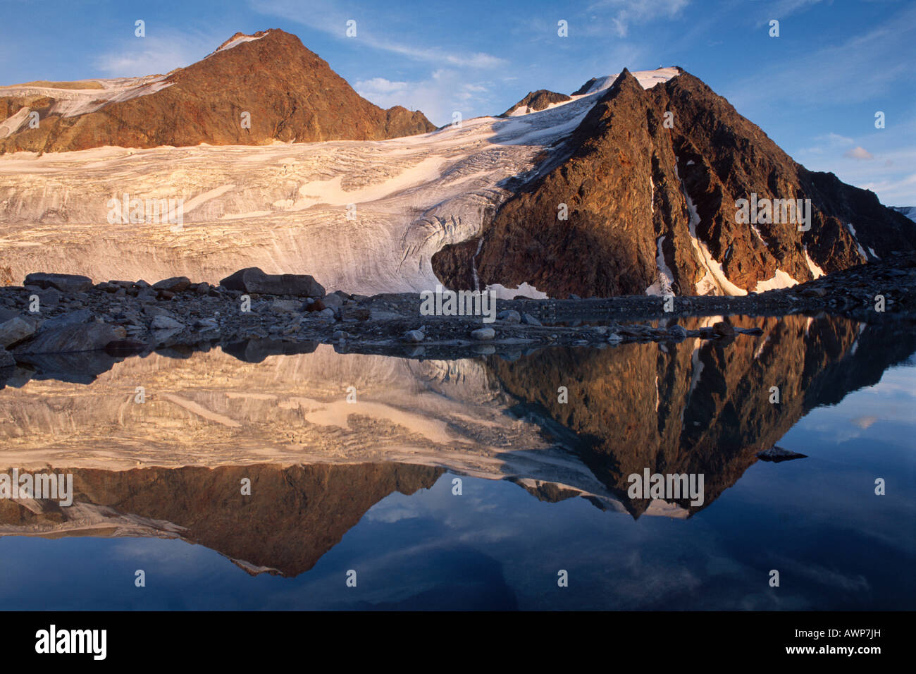 Mt. Schwarze Schneid reflected on the surface of an alpine lake in the Oetztal Alps, North Tirol, Austria, Europe Stock Photo