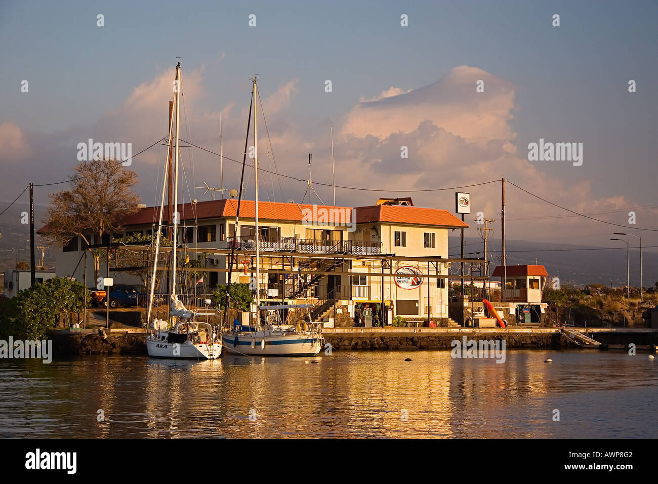 The Charter Desk at the Fuel Dock and sailboats at sunset, Honokohau