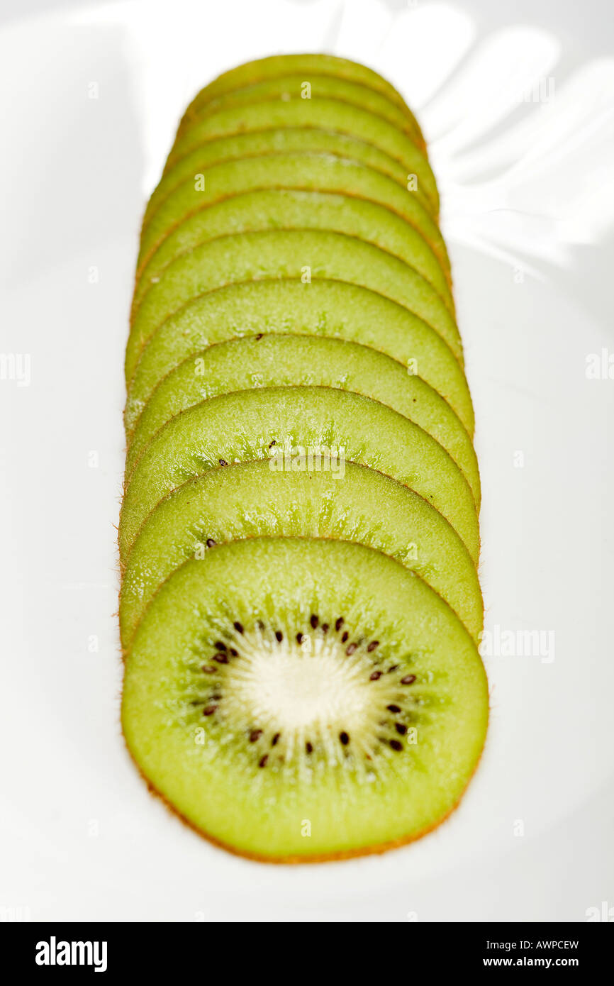 Kiwi slices on a plate Stock Photo