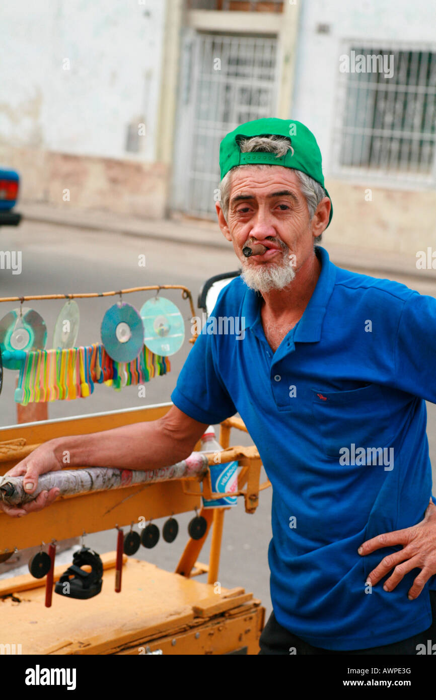 Elderly man selling ice cream from a rickshaw, Havana, Cuba, Caribbean Stock Photo