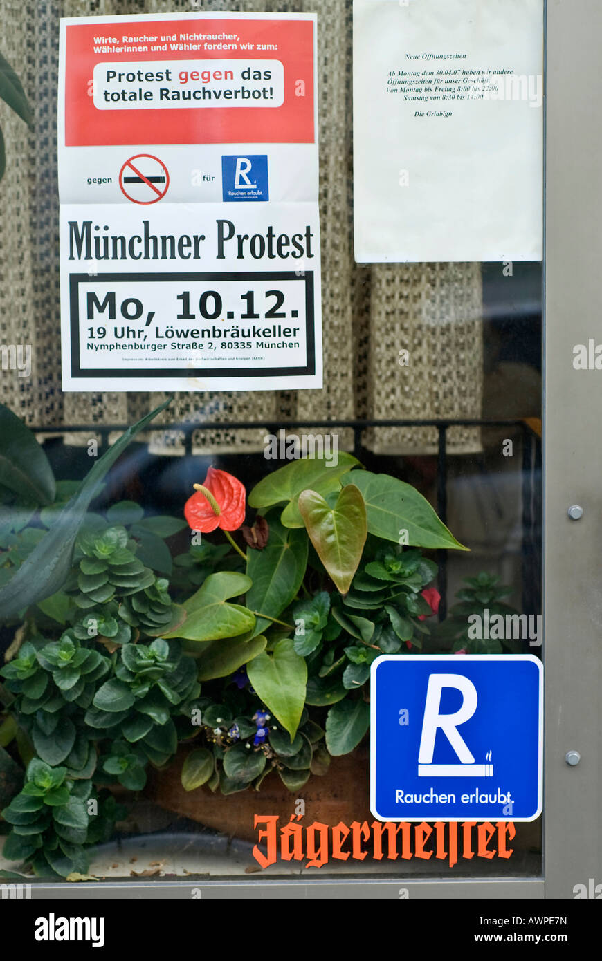 Poster announcing a protest organized against the city-wide smoking ban taking effect Jan 1, 2008, posted on a bar window in We Stock Photo
