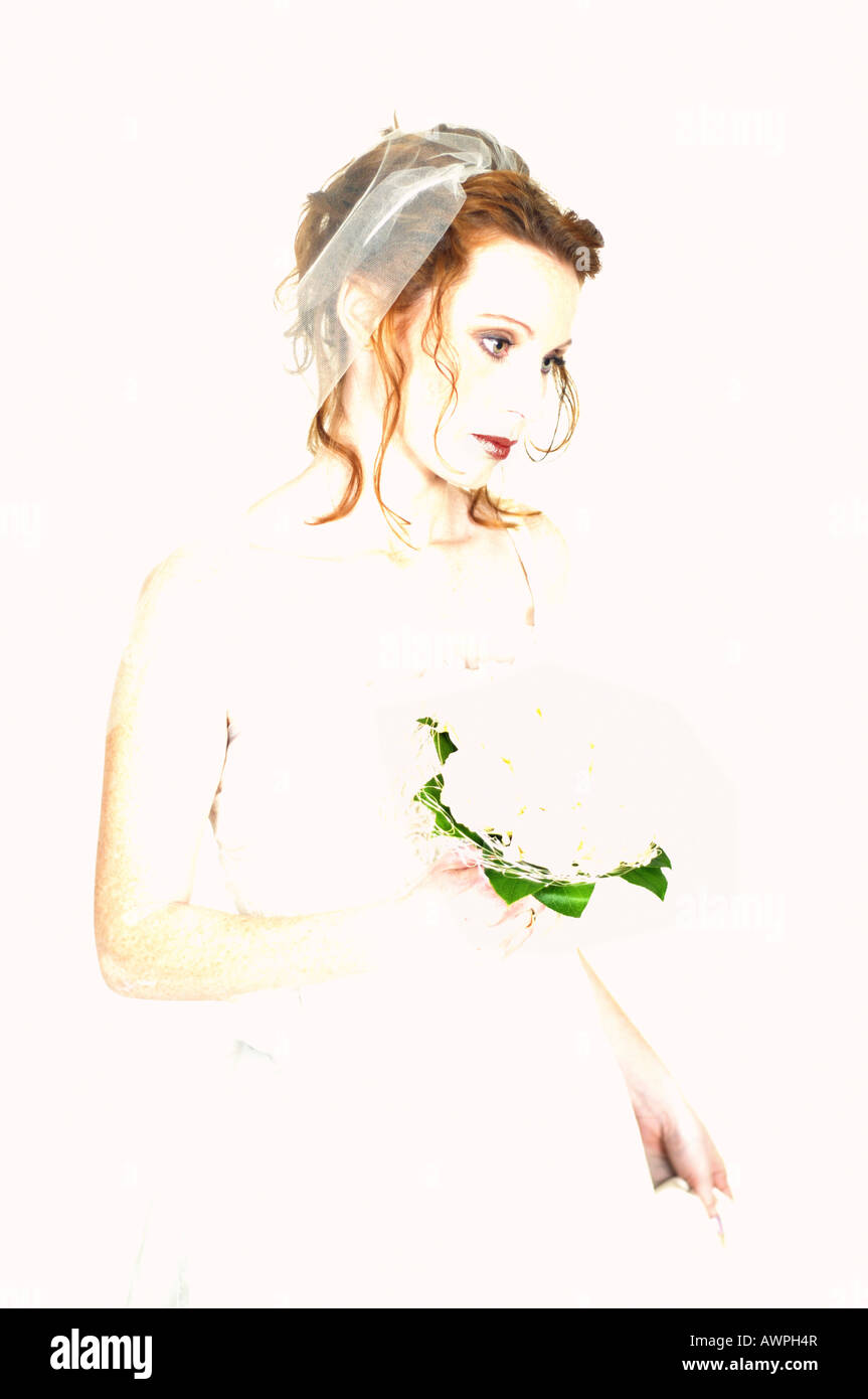 Young bride with bridal bouquet Stock Photo