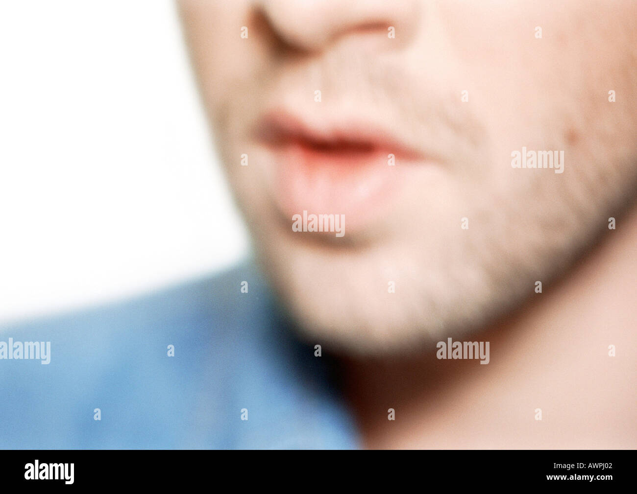 Man's lower face, close-up, blurred Stock Photo