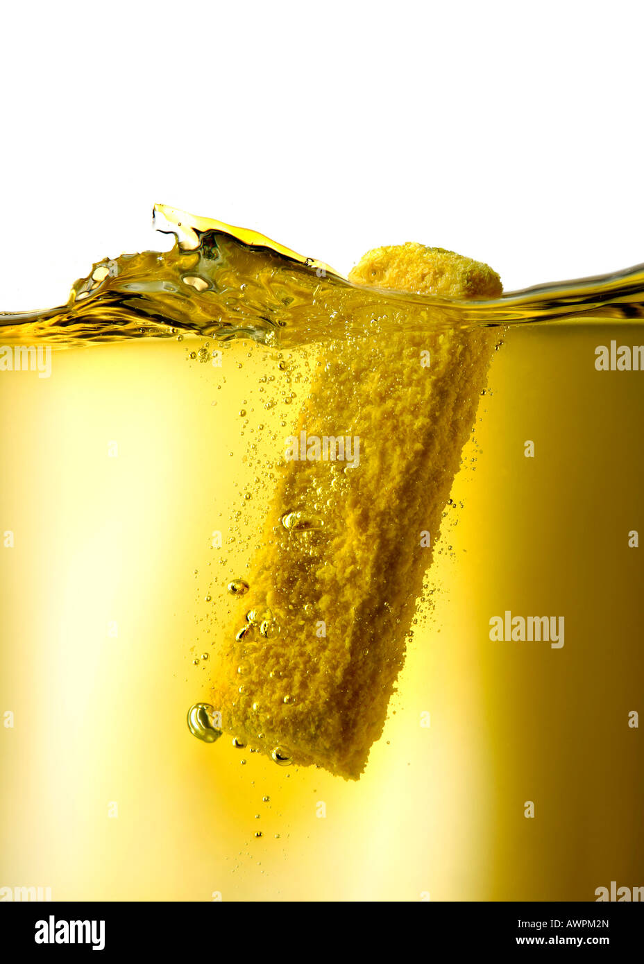 Fishstick (fishfinger) falling into cooking oil Stock Photo
