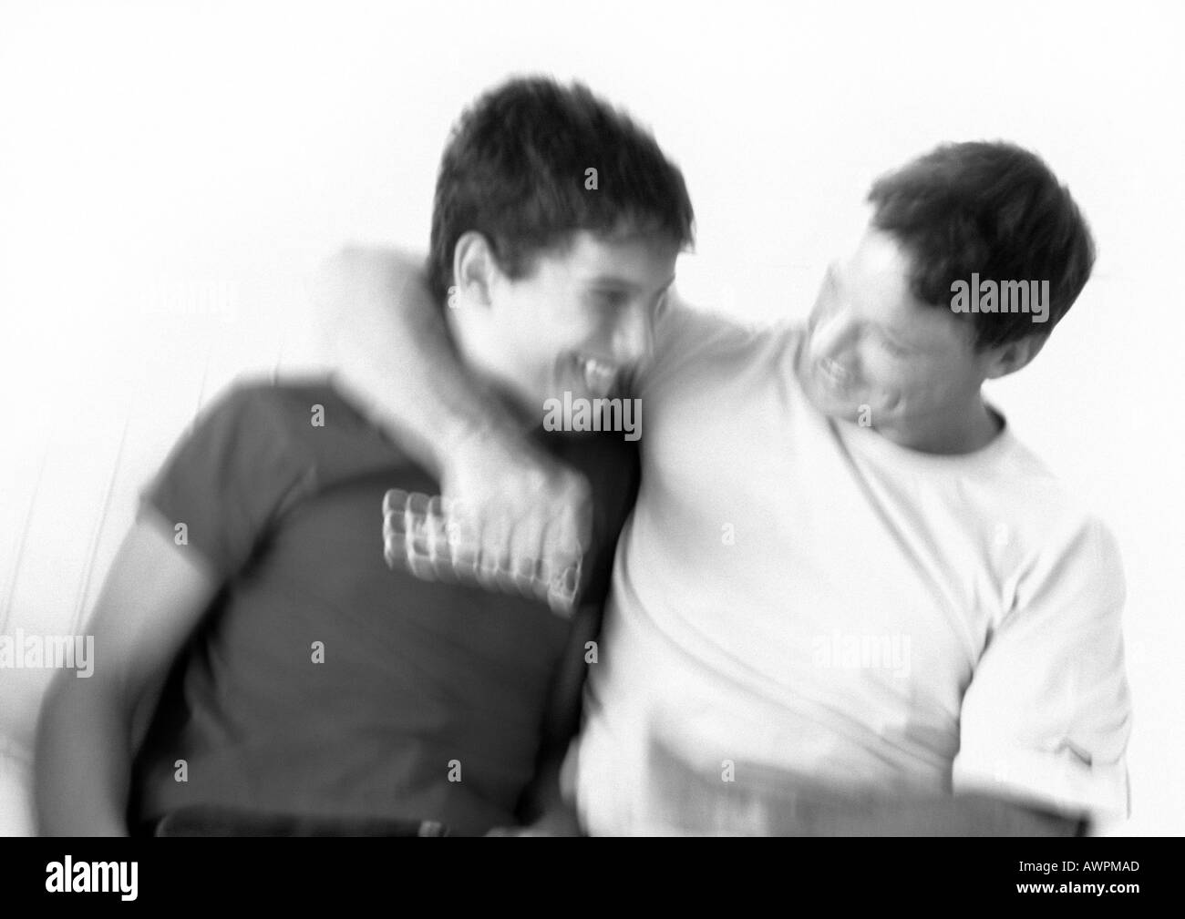 Happy teen parents laugh Black and White Stock Photos & Images Alamy