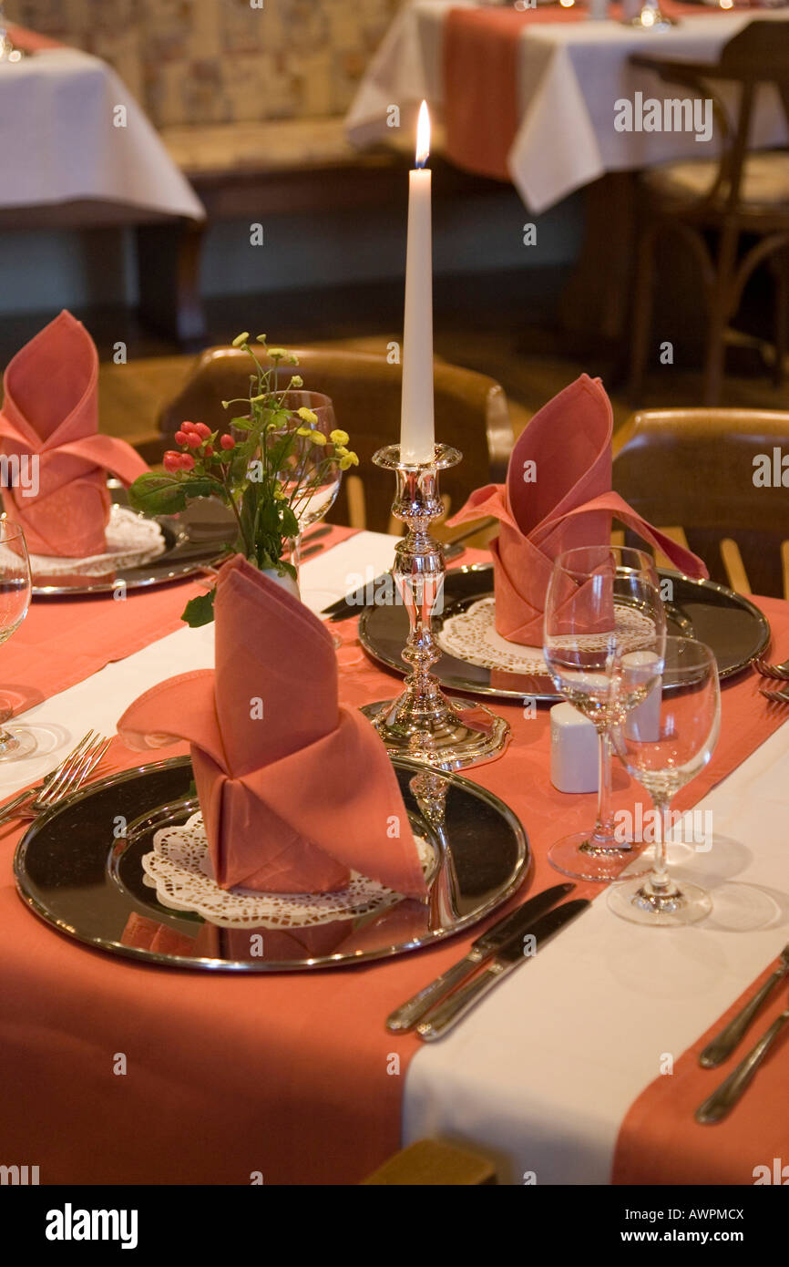 Elegant well-laid table in a gourmet restaurant Stock Photo