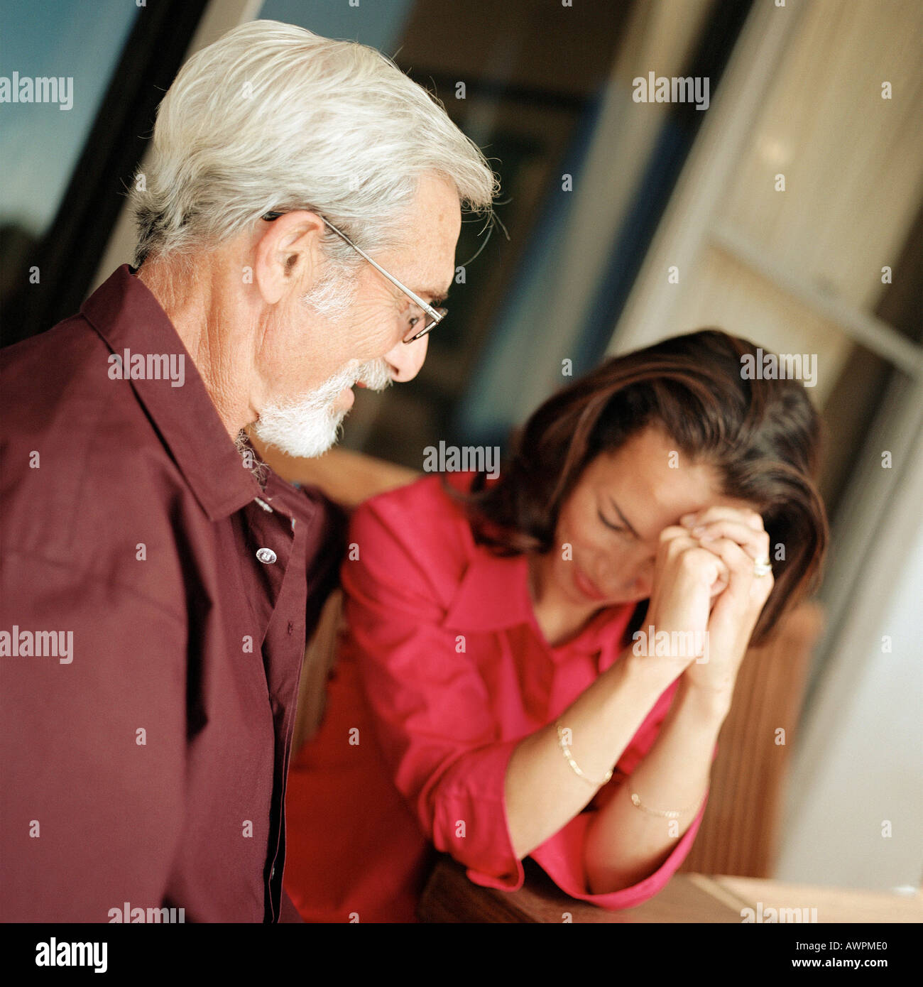 Senior man looking at woman Stock Photo