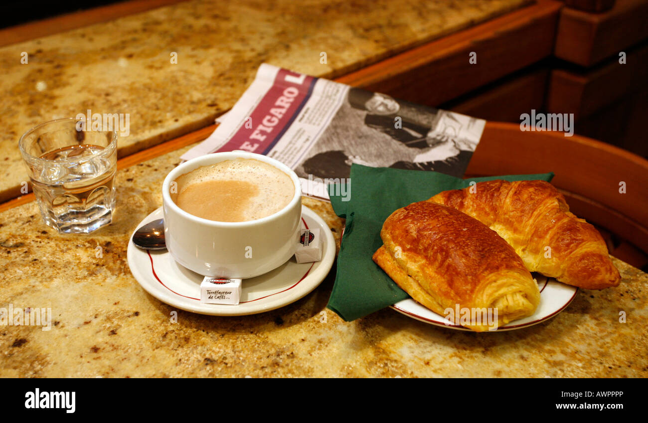 Café au lait and croissants for breakfast (petit déjeuner), Quartier Latin, Paris, France, Europe Stock Photo