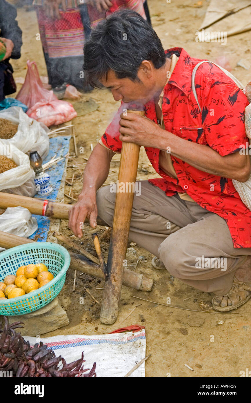 Vietnamese is smoking his pipe, Vietnam, Asia Stock Photo
