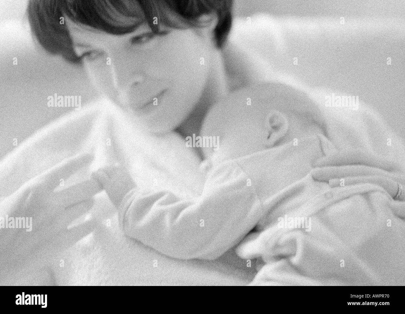 Baby sleeping on mom chest Black and White Stock Photos & Images Alamy