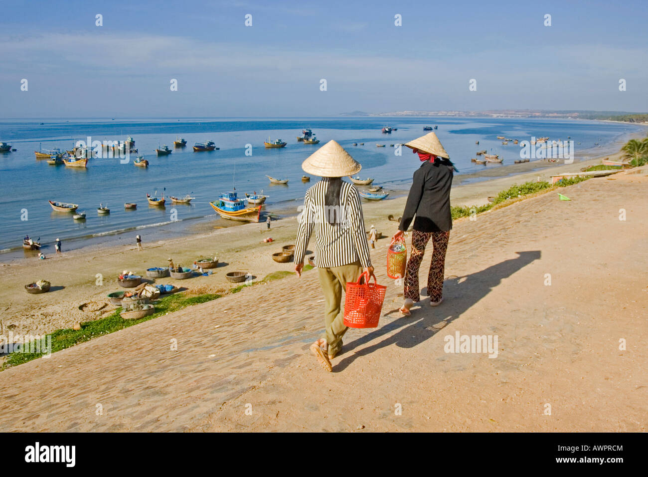 Two Vienamese women, harbour of Mui Ne, Vietnam, Asia Stock Photo