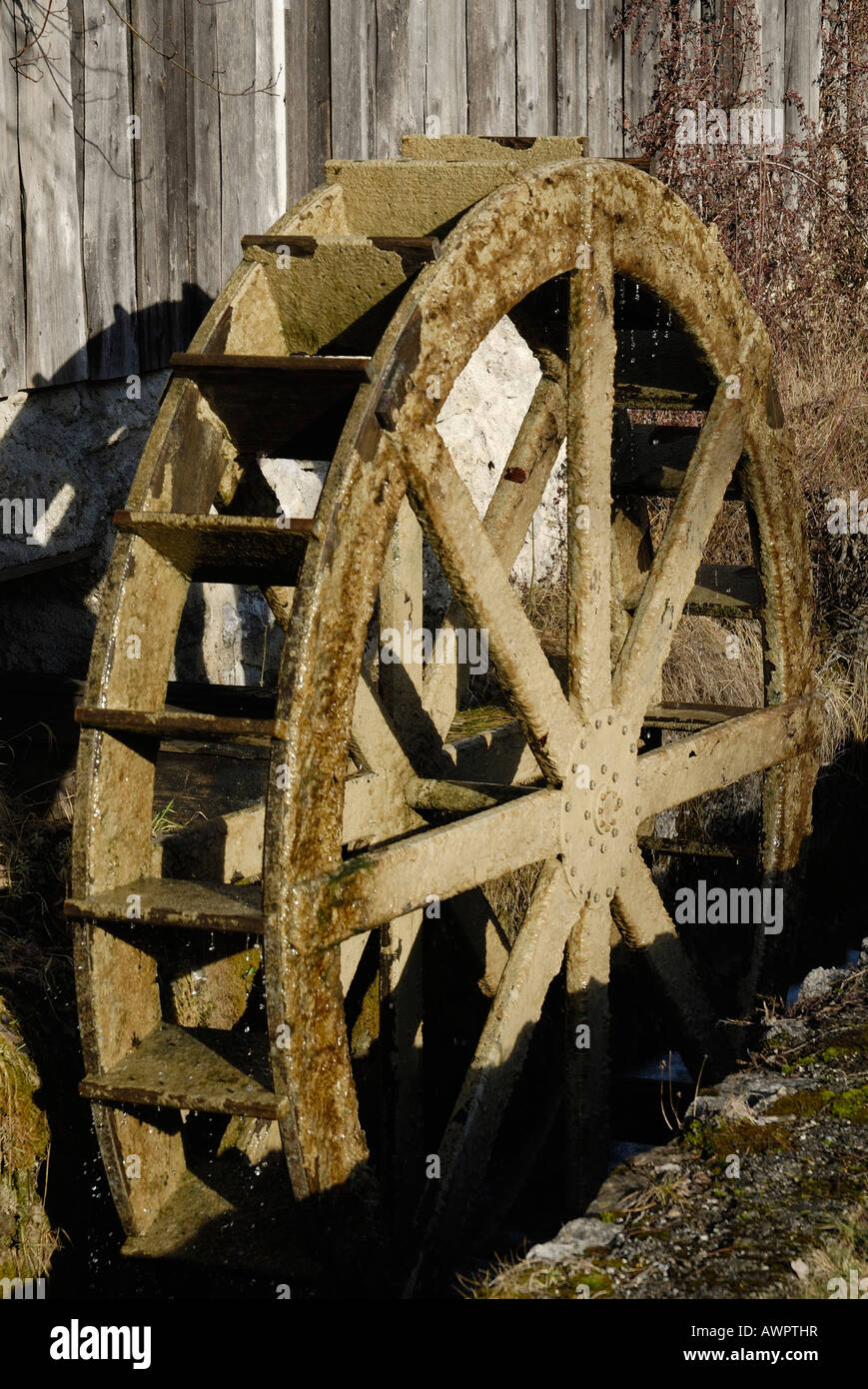 Wooden mill wheel at an old sawmill in Nussdorf, Bavaria, Germany, Europe Stock Photo