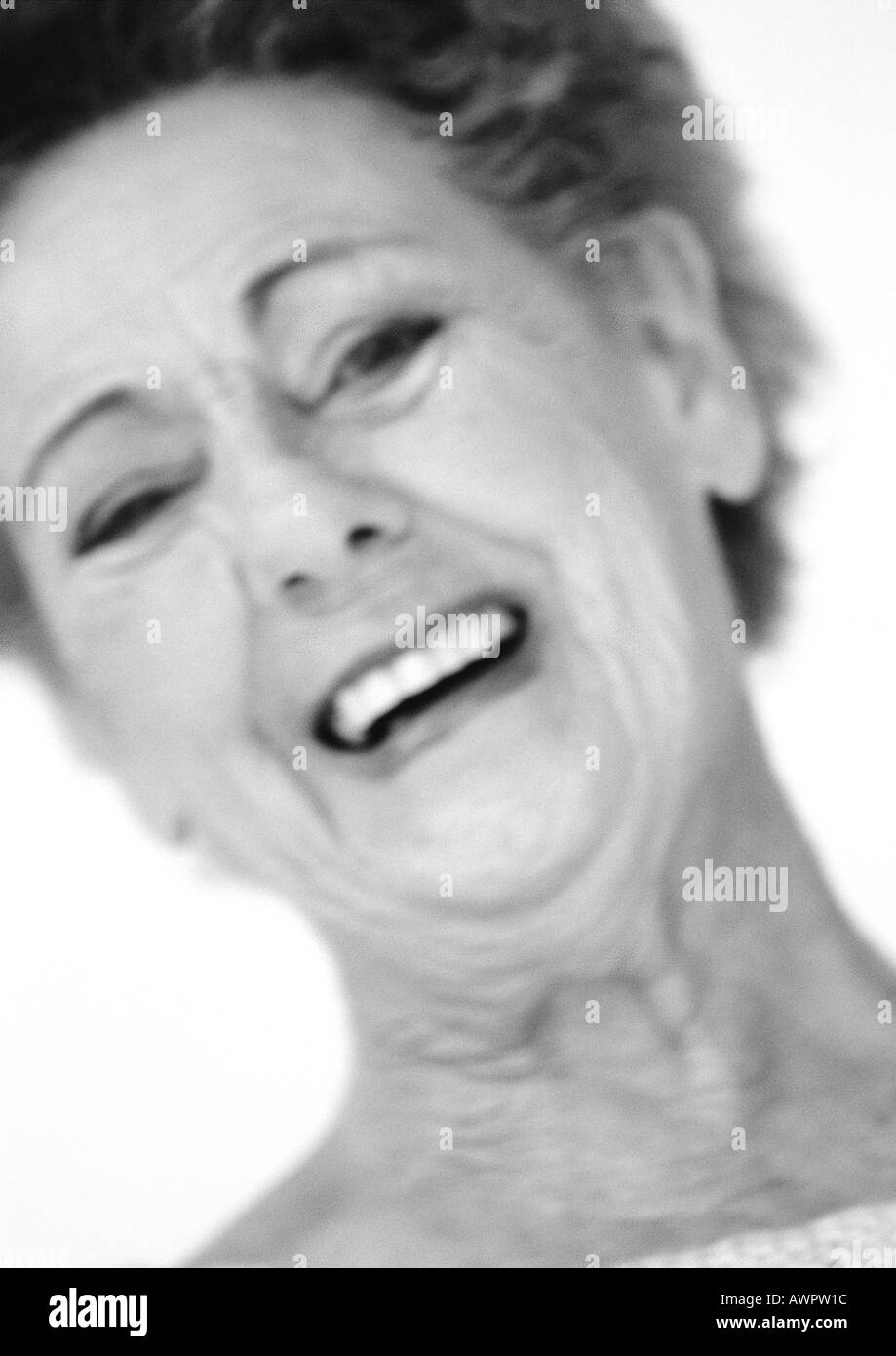 Senior woman laughing, close-up, portrait, b&w Stock Photo