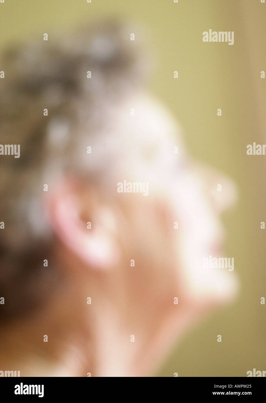 Senior woman, side view, close-up, portrait, blurred Stock Photo