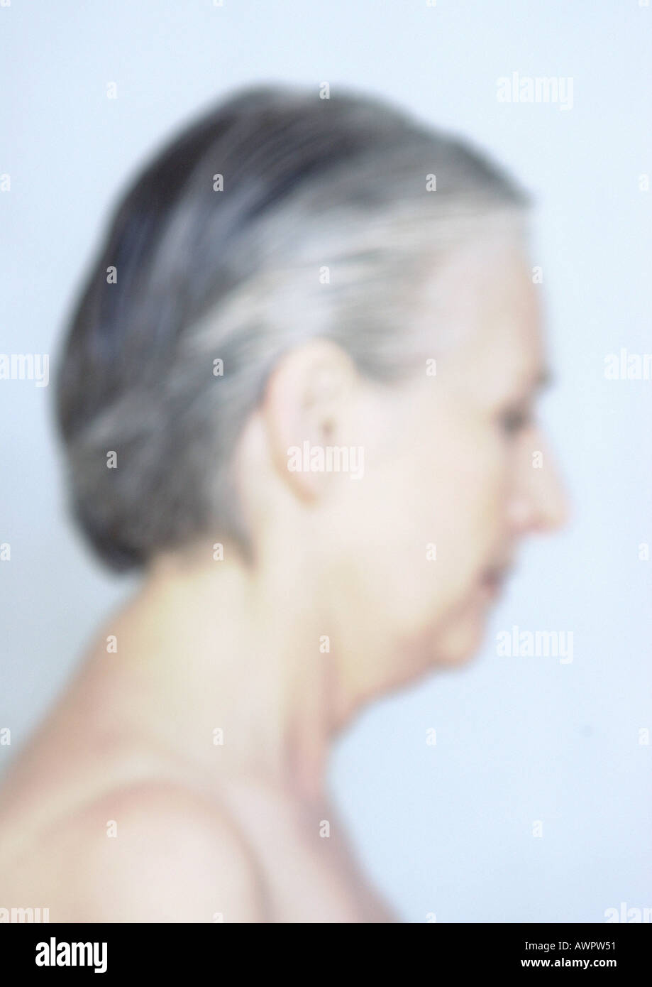 Mature woman, side view, blurred Stock Photo