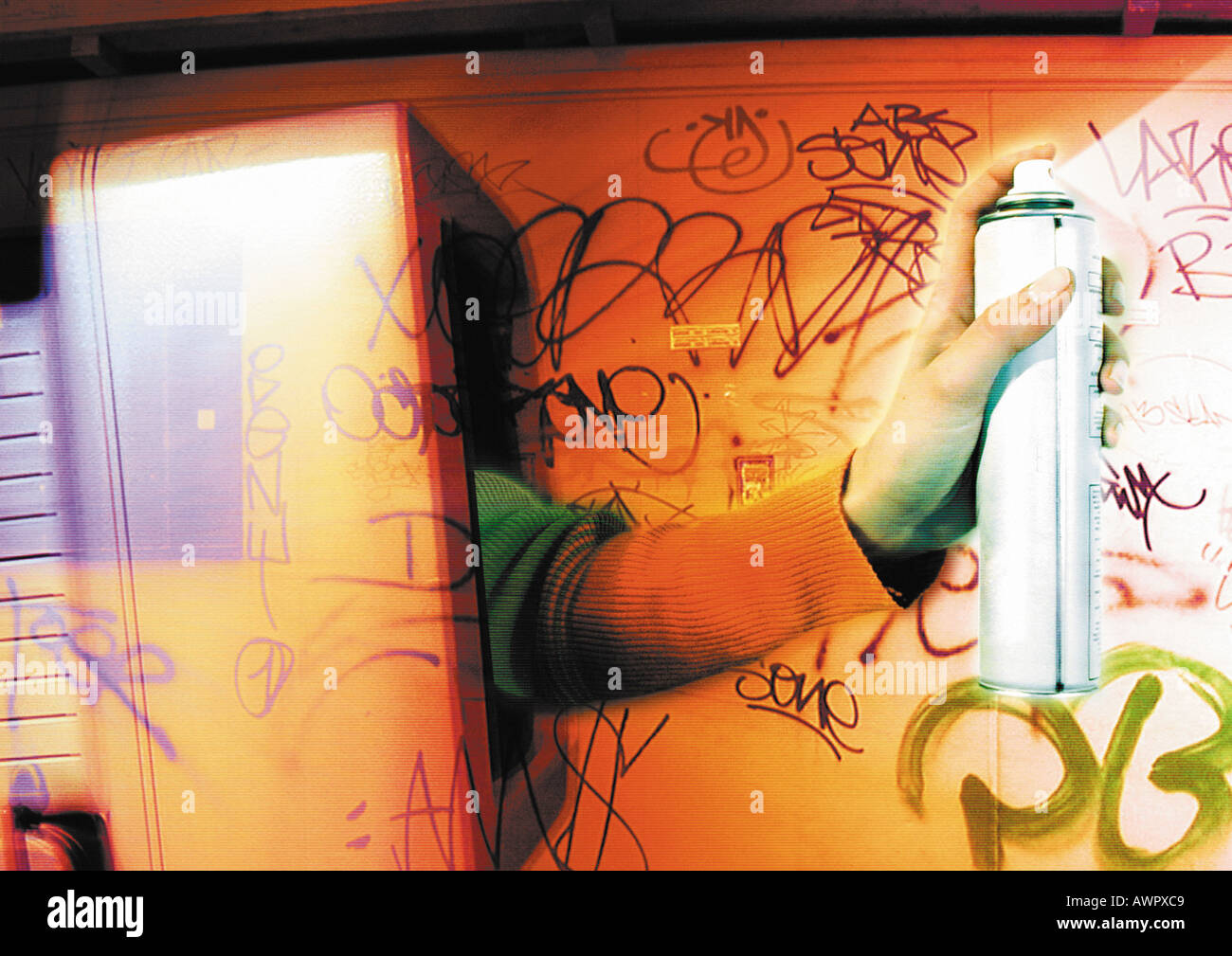 Hand spraying aerosol emerging from hires stock photography and images