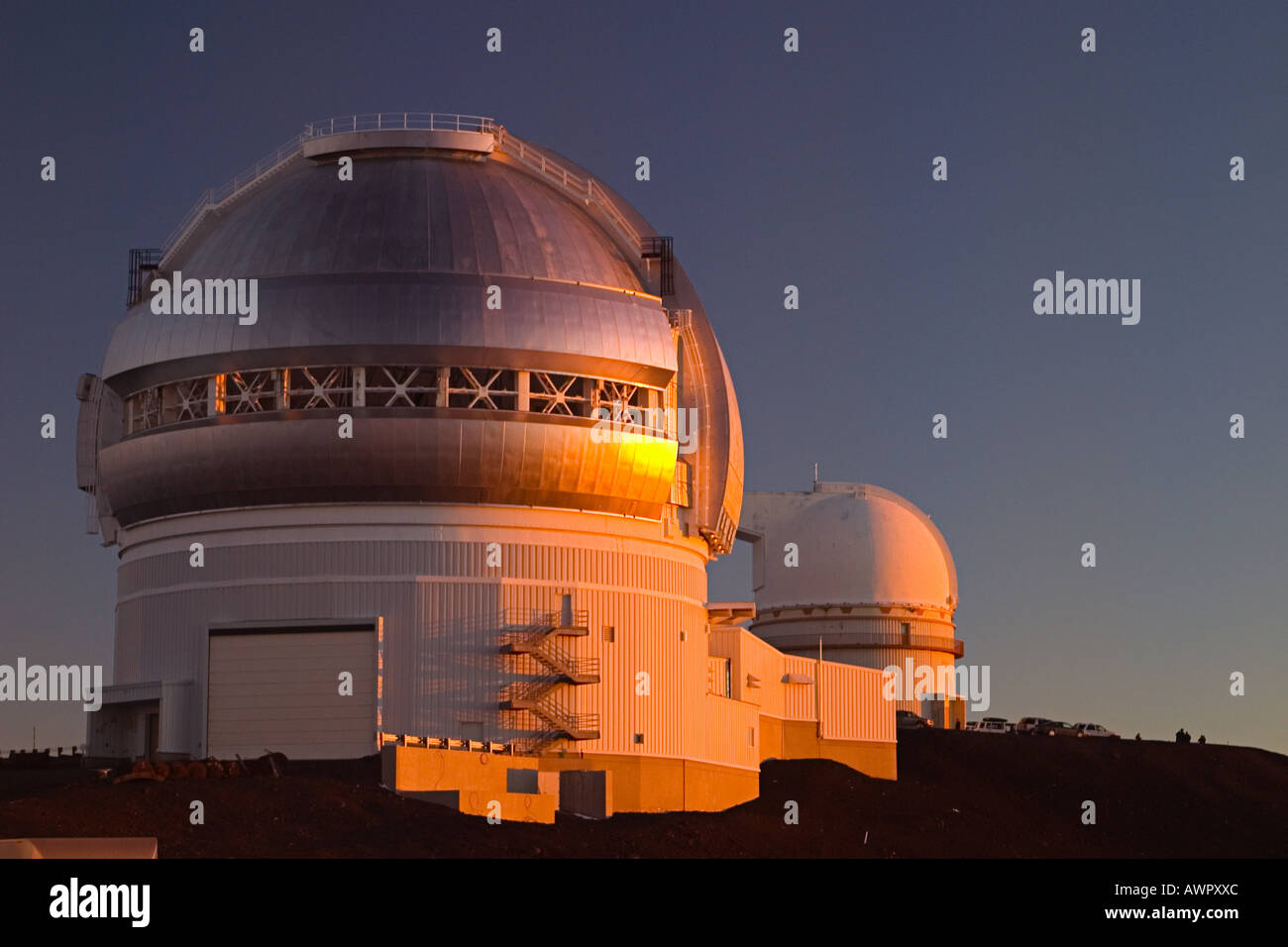 Gemini Northern Telescope and University of Hawaii 2.2-meter Telescope at sunset, Mauna Kea Observatories, Big Island, Hawaii Stock Photo