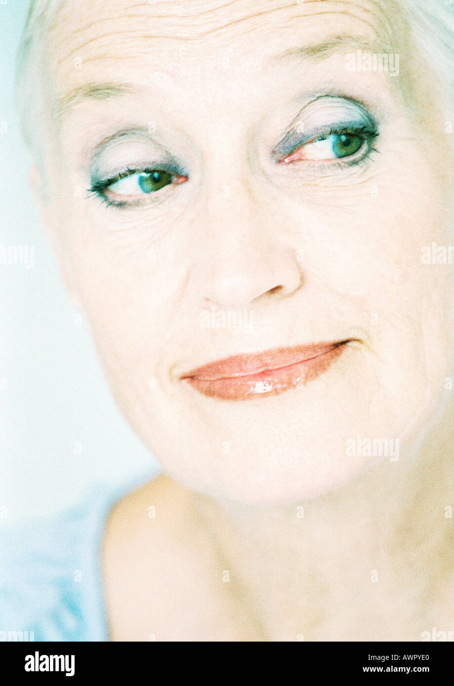 Mature woman looking to the side, close-up, portrait Stock Photo