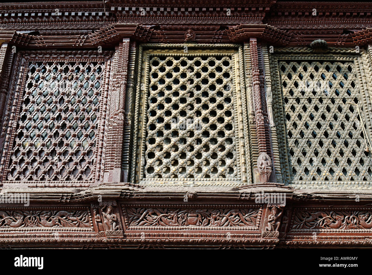Historic window carved in wood, Swayambhunath, Kathmandu, Nepal Stock Photo