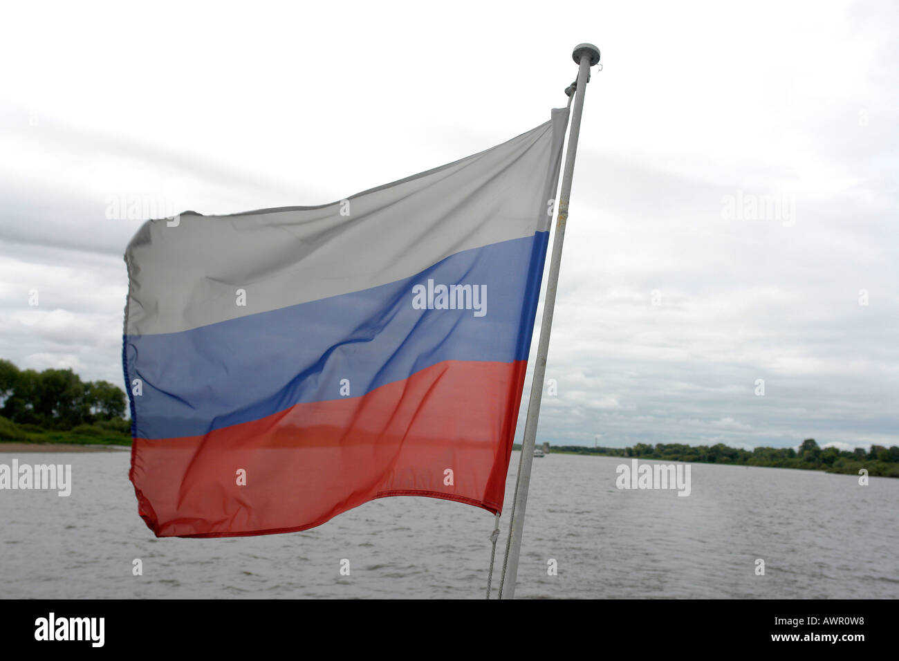 RUSSIA Russian flag over the River Volkhor C Sean Sprague 2006 Stock Photo