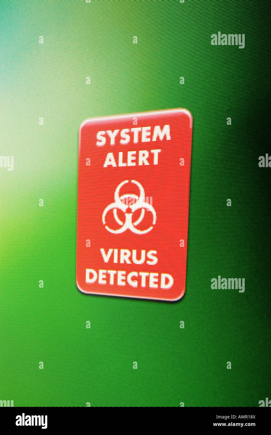 Computer monitor shot, 'system alert virus detected' message Stock Photo