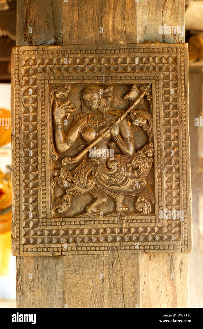figure Sri lanka wood carving on supporting temple posts Embekke Devale